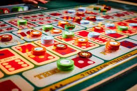 Antarmuka kontrol taruhan Ganesha Gold dengan tombol putar dan pengatur bet yang jelas